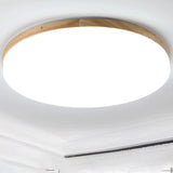 O lampă de tavan LED simplă, rotundă, realizată din acril.