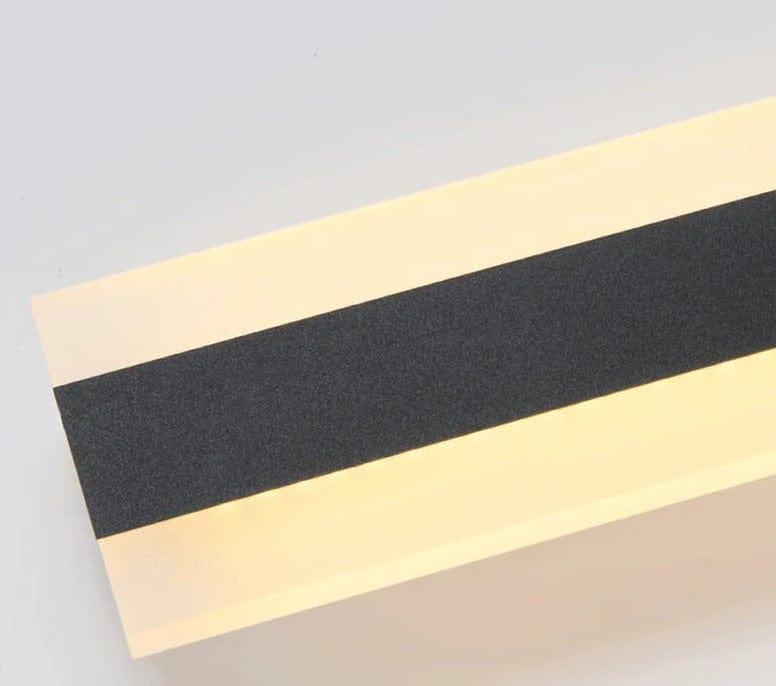 Lampa ścienna w paski