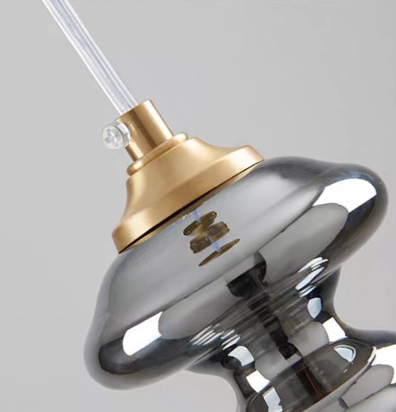 Nowoczesna lampa wisząca w kolorze szarym