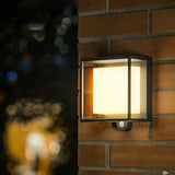 Nowoczesny prostokątny czujnik akrylowy zasilany energią słoneczną Wodoodporna zewnętrzna lampa ścienna IP65