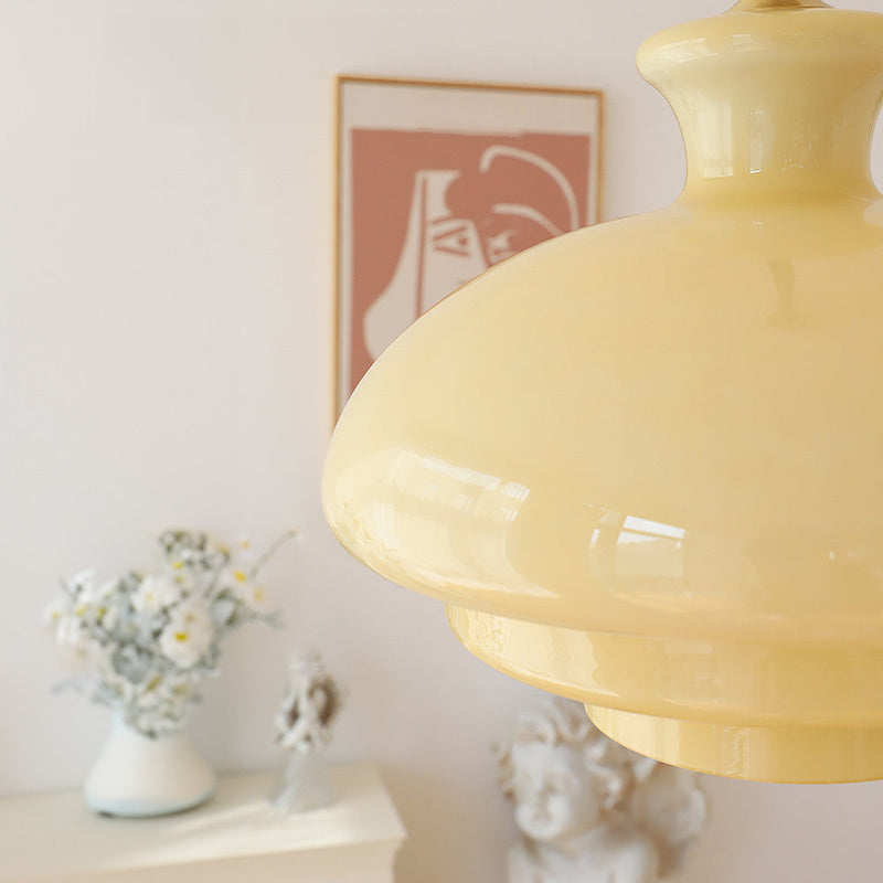 Lampa wisząca Bauhaus wykonana z kremowo-żółtego szkła