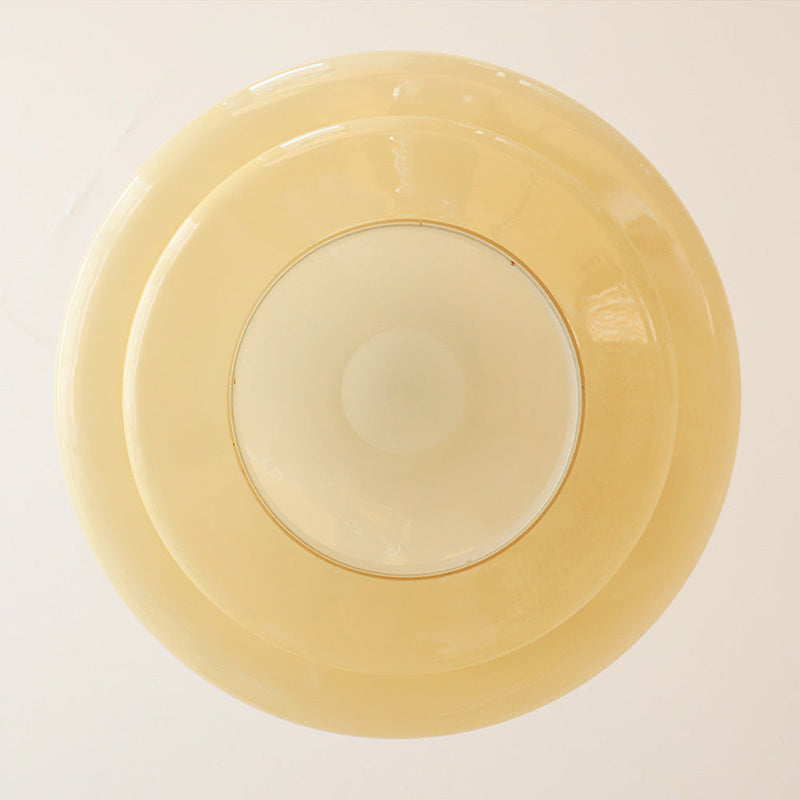 Lampa wisząca Bauhaus wykonana z kremowo-żółtego szkła