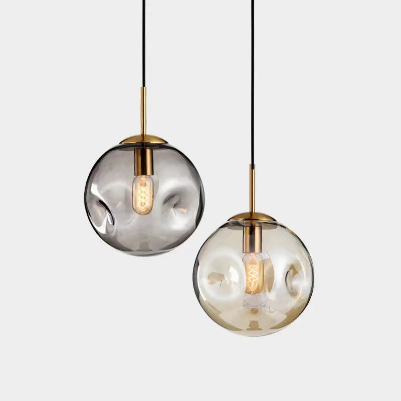 Kulista lampa wisząca ze szkła Brikey