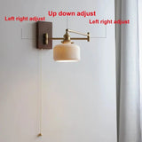 Ceramiczna lampa ścienna z drewnianą płytką