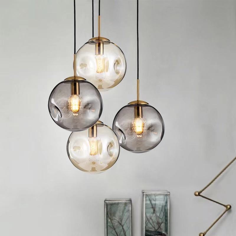 Kulista lampa wisząca ze szkła Brikey