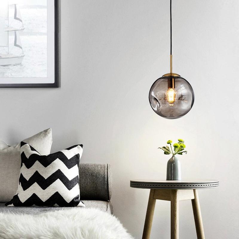 Kulista lampa wisząca ze szkła Brikey