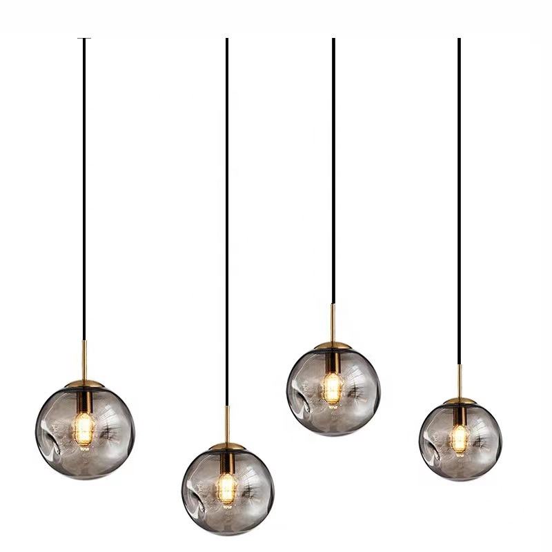 Kulista lampa wisząca ze szkła Brikey